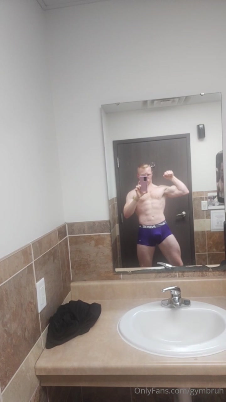 Flexing hard in the mirror