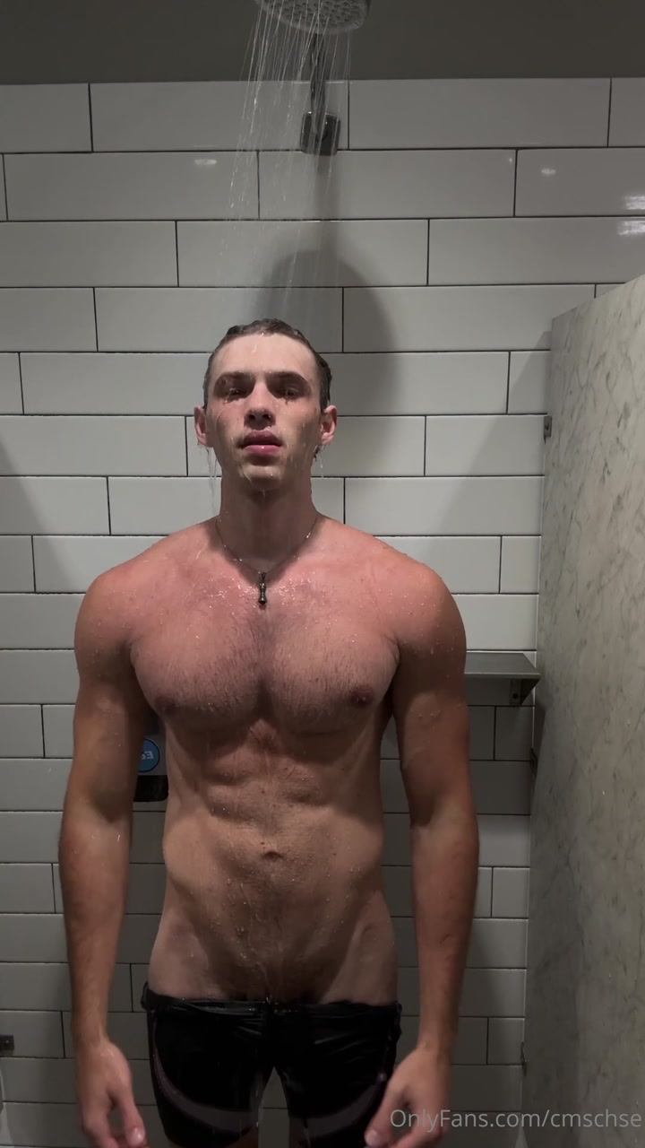 Showing off my muscular body in the gym shower