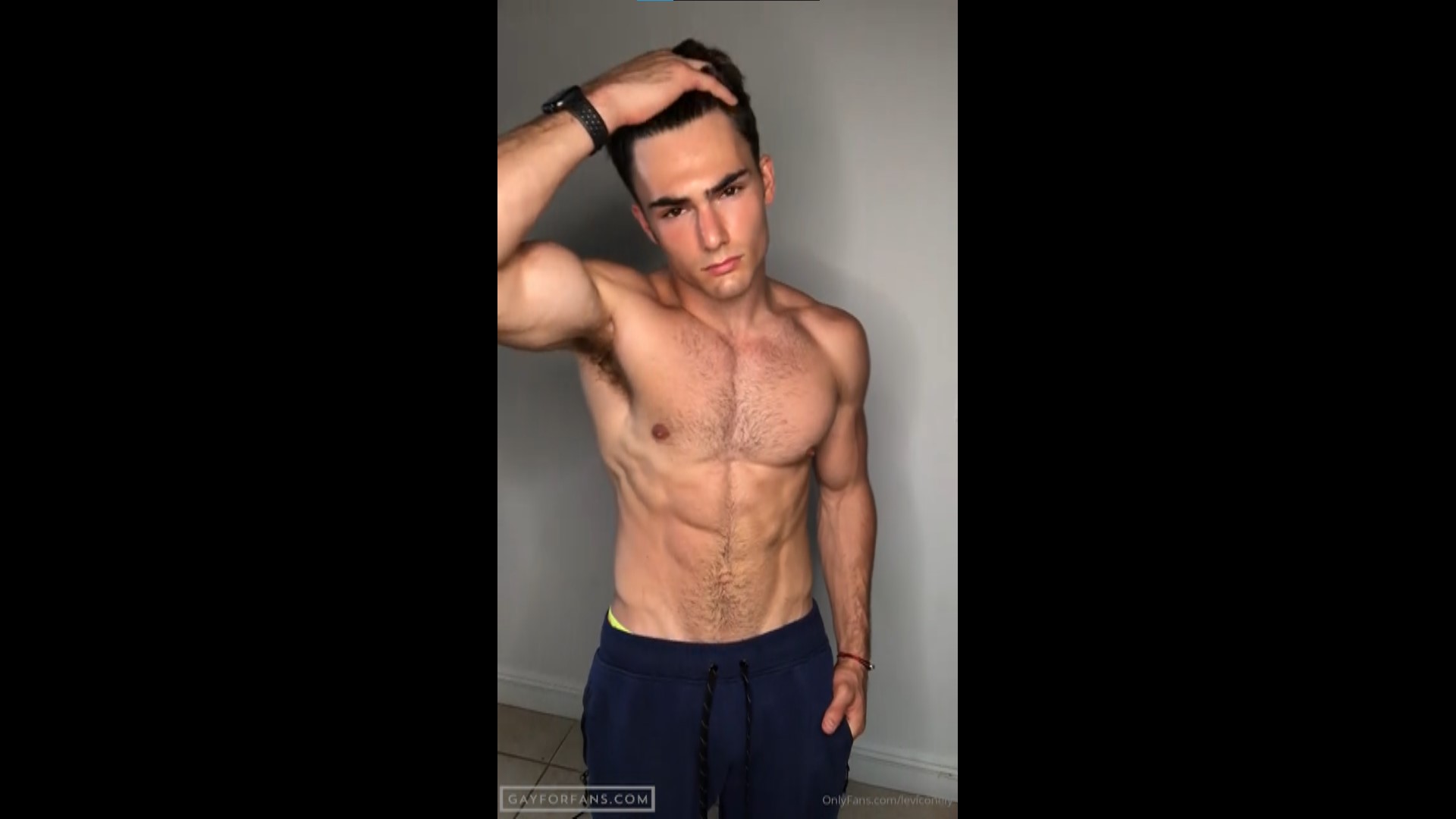 Showing off my body and tensing my abs - Levi Conely