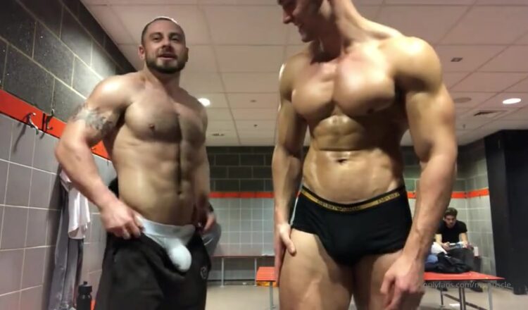 Flexing in the gym change room with a mate - MrMuscle