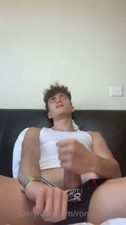 onlytwinks thumbnail for Romeo Twink strips with a hard 8 inch cock and cums on himself